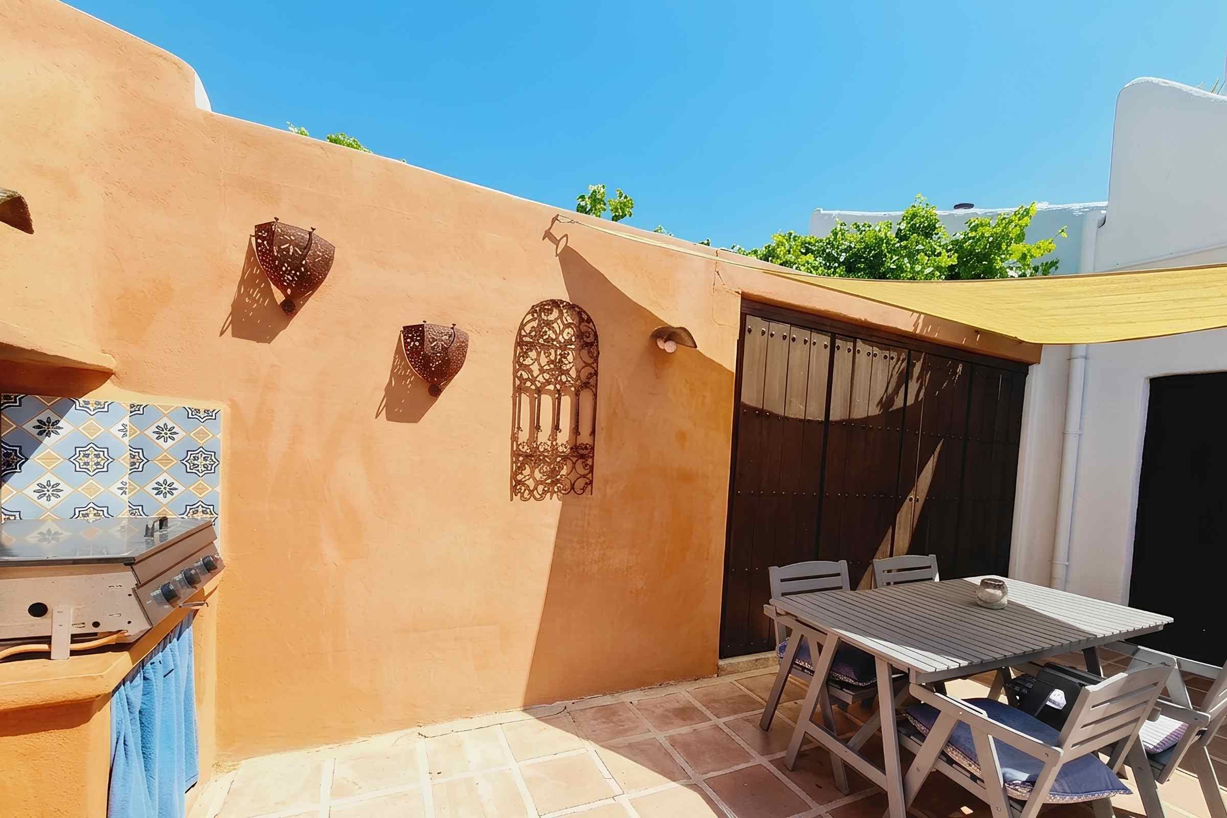 Dine and Relax Outdoors in this Private Courtyard.