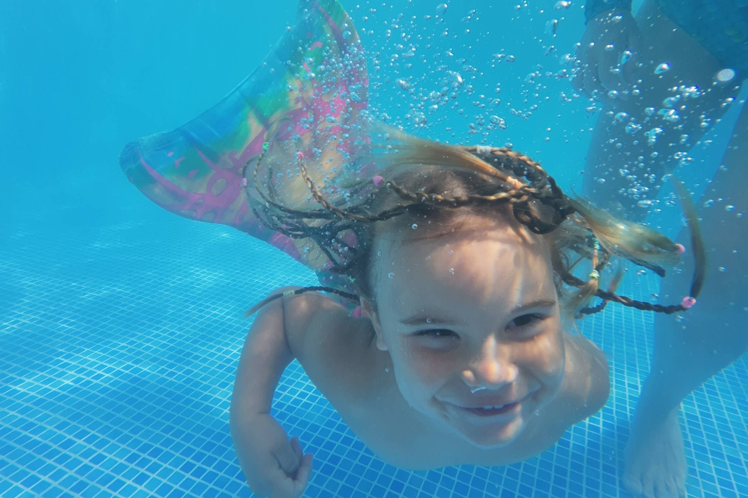 Mermaid swimming session in the pool at Cortijo Los Lobos